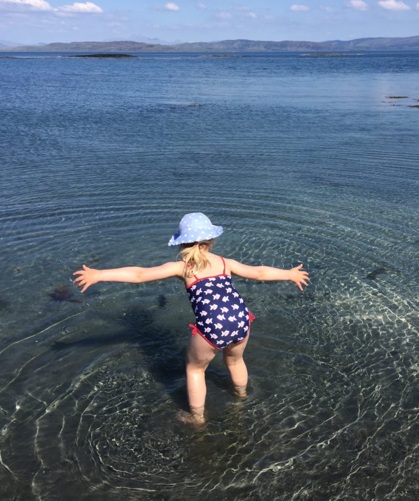 Ruby paddling in the sea